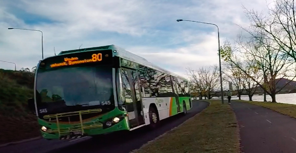 Canberra buses are equipped with yellow bicycle racks so commuters can integrate bike travel with bus travel.